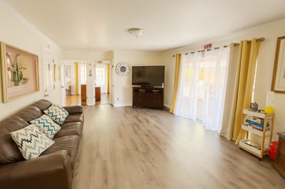 Bright activity room with comfortable seating