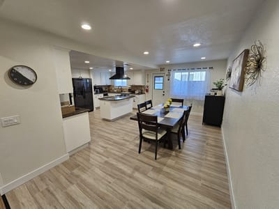 Bright dining area with modern decor and seating