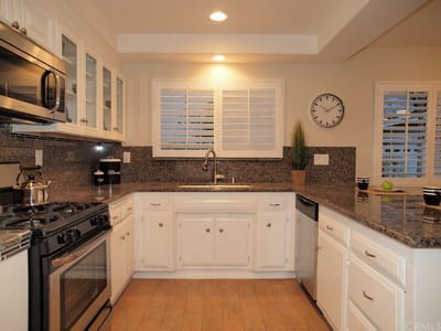 Bright kitchen with modern appliances and decor