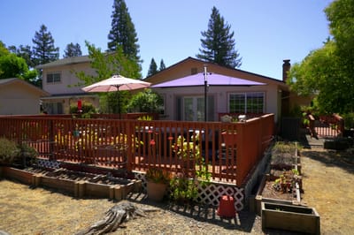 Exterior view of a facility with outdoor seating
