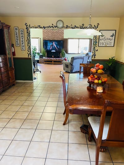 Common area with dining table and decorative elements