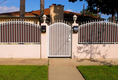 Exterior view of a gated entrance to the facility