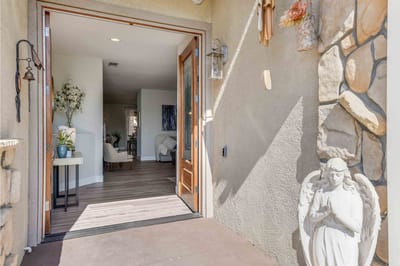 Welcoming entrance view of the facility with an angel statue