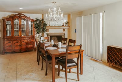 Elegant dining room with wooden table and chandelier