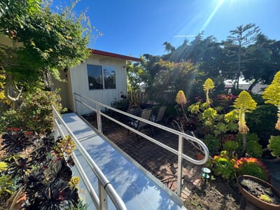 Pathway leading to a beautifully landscaped outdoor garden