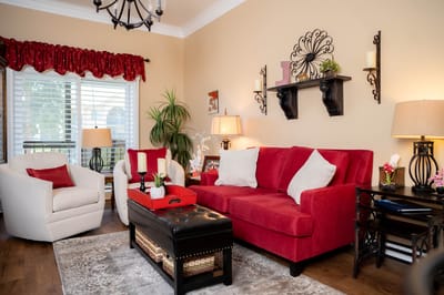 Cozy interior common area with red furniture