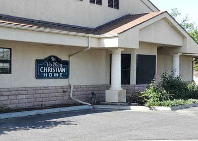 Exterior view of Valley Christian Home with signage