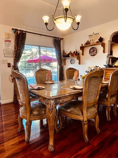 Elegant dining room setting with wooden table and chairs