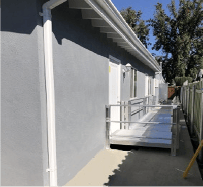 Side view of a facility with a ramp