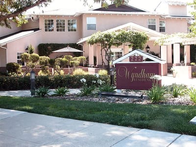 Exterior view of Wyndham Residence with landscaping