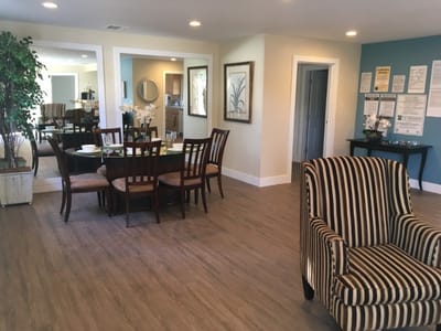Dining area with tables and chairs in a bright interior