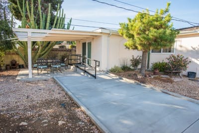 Outdoor patio area with seating in the garden