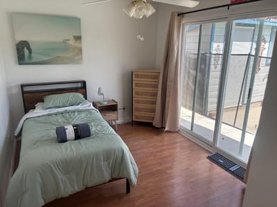 A cozy private resident room with natural light