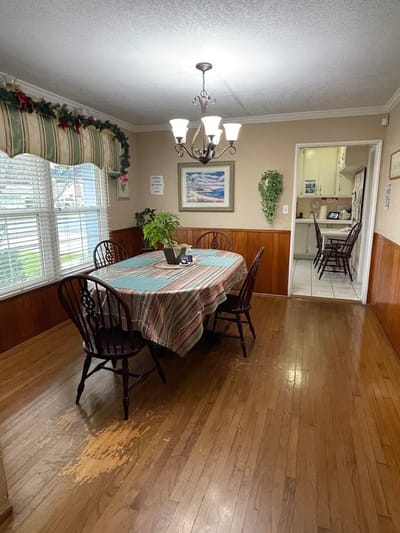 Dining room with a large table and chairs