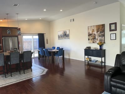 Interior common area with dining table and seating