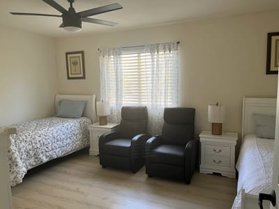 Cozy interior of a resident room with two beds