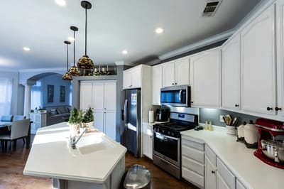 Bright kitchen area with modern appliances and decor