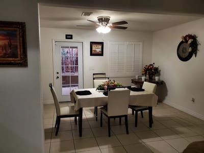 Dining room setup with a table and chairs