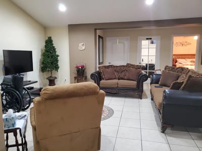 Cozy common area with couches and a TV