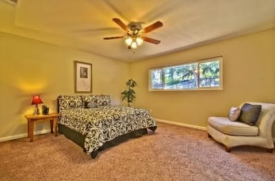 Cozy private room with a king-sized bed and natural light
