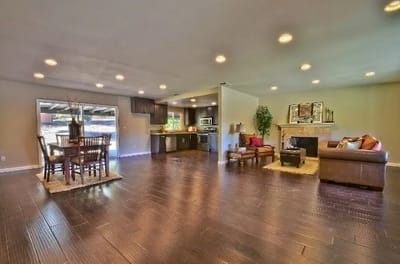 Bright common area with seating and dining space