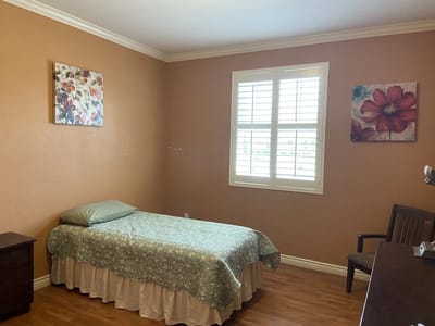 Private resident room with single bed and decor
