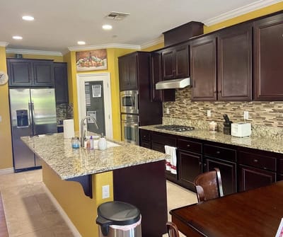 Modern kitchen with granite countertops at a care facility