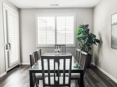 Dining area with glass table and chairs