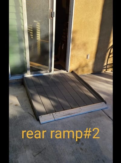 A ramp leading to a facility door