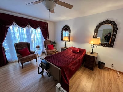 Cozy resident room with armchairs and warm lighting