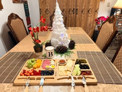 A beautifully arranged charcuterie board on a dining table