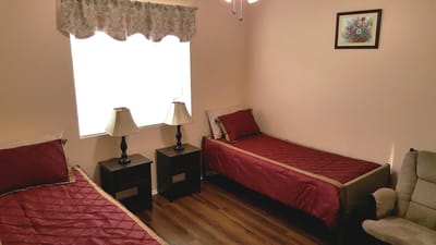 Cozy resident room with two single beds
