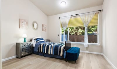 Cozy resident room with natural light and decor