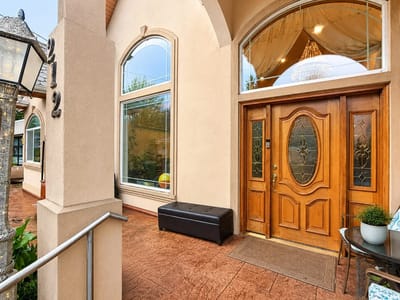 Entrance to Bellevue Rose AFH with wooden doors