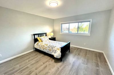 Private resident room with a bed and window