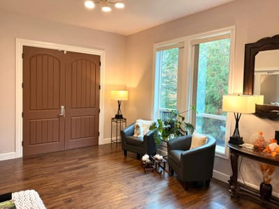 Cozy lobby area with chairs and decorative elements