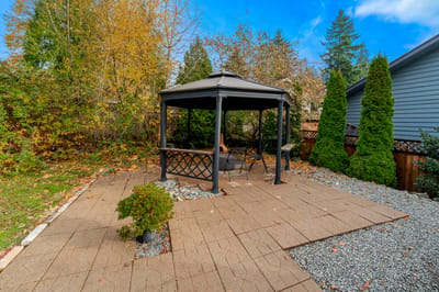 Gazebo in a serene outdoor space with trees