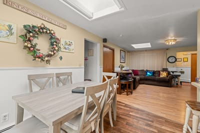 Cozy common area with dining table and seating