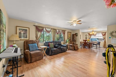 Bright common area with comfortable seating and natural light