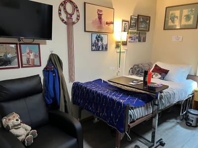 A cozy resident room with personal decorations