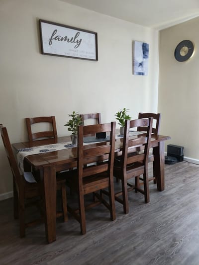 Dining room with wooden table and chairs