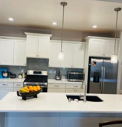 Modern kitchen interior with fruits on counter
