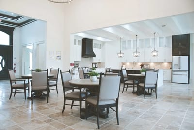 Bright dining area with circular tables and modern decor