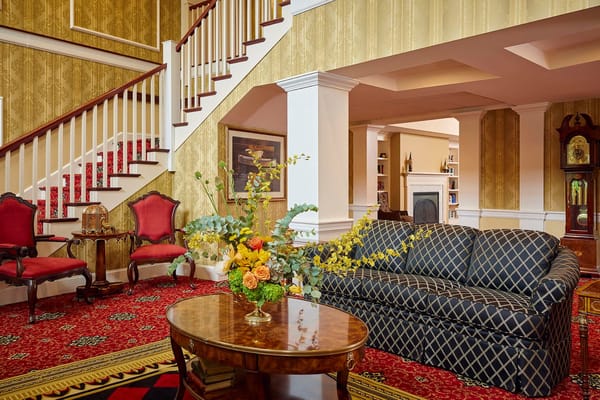 Bright interior common area with a floral arrangement