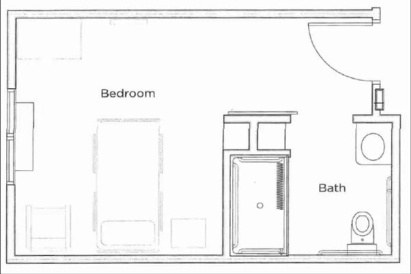 Architectural floor plan of a bedroom and bath