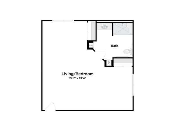 Black and white floor plan of a studio apartment showing a large open living/bed