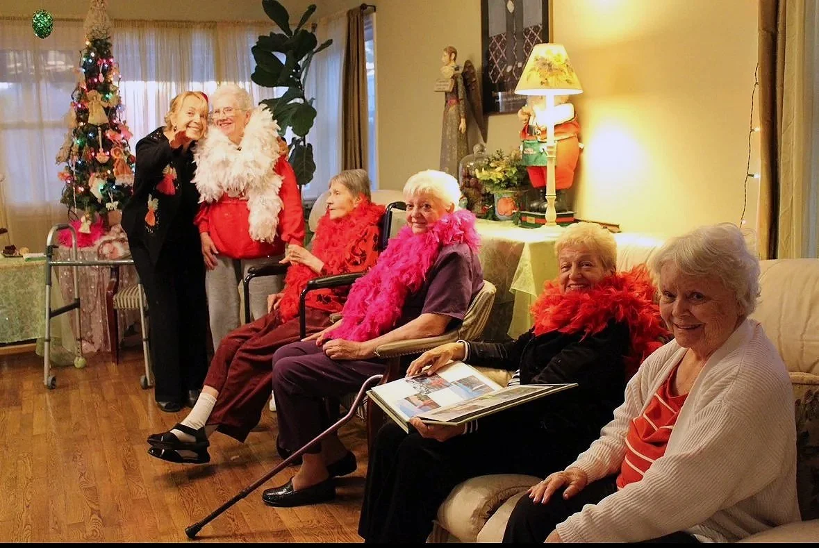 Seniors celebrating in a festive indoor setting