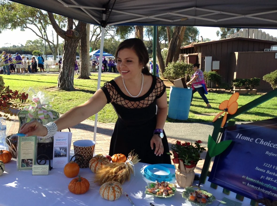 Staff member engaged in an outdoor event.