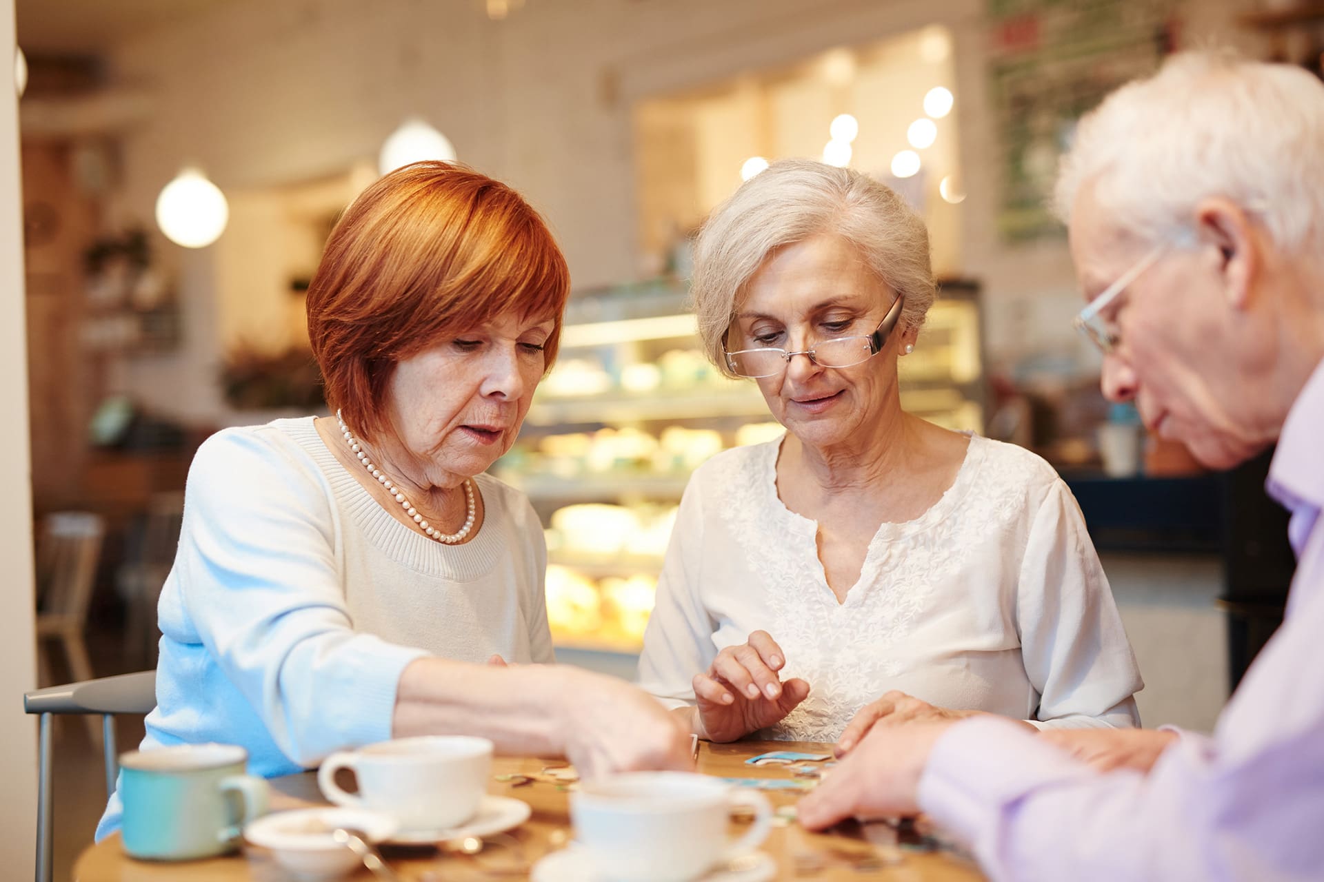 Residents engaging in a puzzle activity