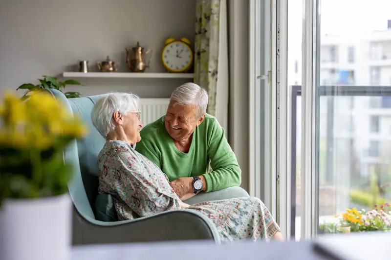 A couple enjoying a moment together in an interior setting